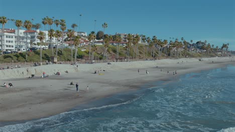 Panning-shot-of-San-Clemente-beach-off-of-the-pier