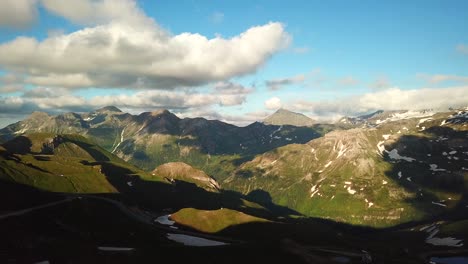 Landscape-aerial-view-over-the-alpine-road-grossglockner-hochalpenstrasse,-through-austrian-mountains