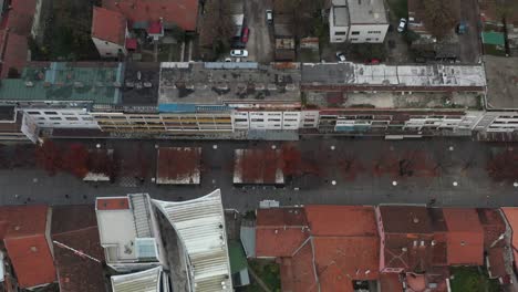 Aerial-flyover-shot-of-a-residential-area-of-Kraljevo,-Serbia-on-an-overcast-day