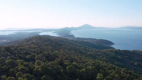 Aerial-flyover-shot-looking-out-over-an-island-chain-near-Losinj,-Croatia