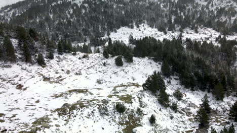 Aerial-elevating-view-of-the-snowy-mountains-in-La-Cerdanya