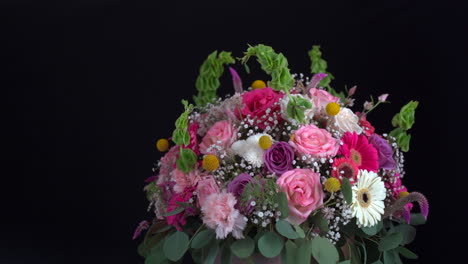 Floral-arrangement-spinning-and-slider-shot-roses-daisy-carnation-gerbera