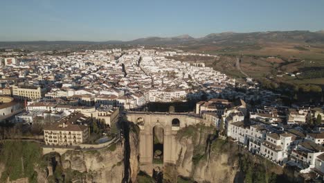 Aerial-view-of-the-town-of-Ronda-and-it's-famous-Puente-Nuevo-landmark,-Spain