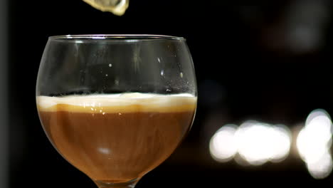 Coffee-drink-served-in-dark-restaurant-with-blurry-background