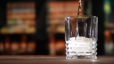 Whiskey-being-poured-into-a-glass-in-Slow-motion-HD