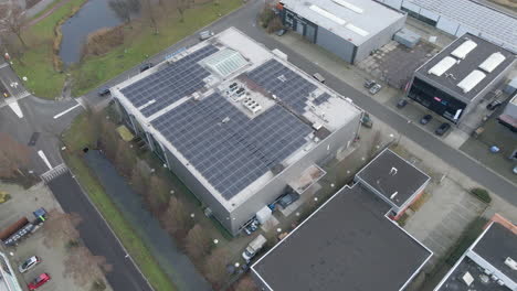 Beautiful-aerial-of-industrial-rooftop-filled-with-solar-panels