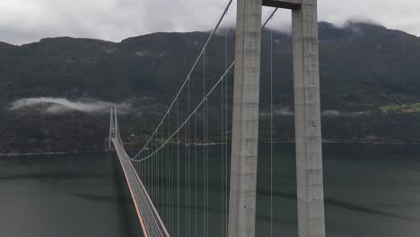 Landing-drone-footage-of-Hardanger-bridge---one-of-the-longest-suspension-bridges-in-the-world