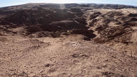 Tilt-up-on-the-vast-emptiness-of-the-sand-dune-sea-Puerto-Peñasco,-Rocky-Point,-Mexico