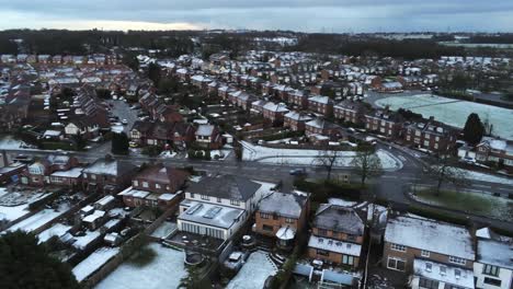 Snowy-aerial-village-residential-neighbourhood-Winter-frozen-North-West-houses-and-roads-reverse-right-orbit
