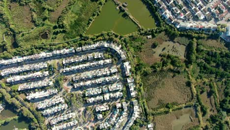 Aerial-pass-above-Middle-class-Suburban-neighbourhood-houses