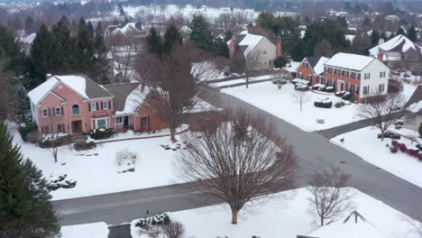 Aerial-of-large-colonial-houses-in-upscale-home-development-community