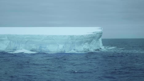 Close-up-of-a-tabular-iceberg-on-a-cloudy-day