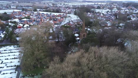 Snowy-aerial-village-residential-neighbourhood-Winter-frozen-North-West-houses-and-roads-right-shot