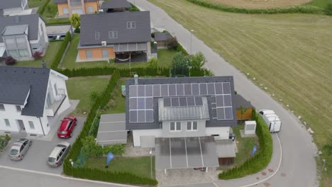 Drone-view-of-solar-panels-on-the-roof-in-the-residential-estate