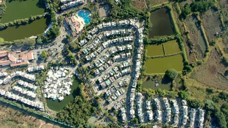 Aerial-pass-above-Middle-class-Suburban-neighbourhood-houses