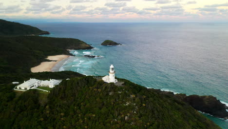 Cinematic-slow-rotating-drone-shot-of-Smoky-Cape-Lighthouse-near-South-West-Rocks,-Kempsey-Shire,-New-South-Wales,-Australia