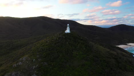 Cinematic-rotating-drone-shot-at-Smoky-Cape-Lighthouse-near-South-West-Rocks,-Kempsey-Shire,-New-South-Wales,-Australia