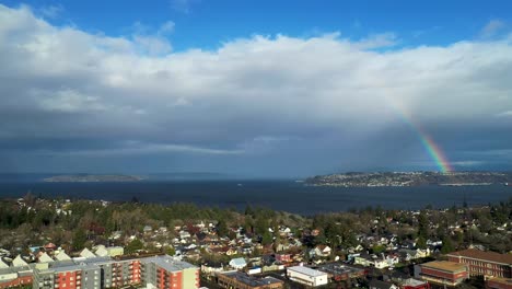 Cityscape-By-The-Port-Of-Tacoma-Overlooking-The-Commencement-Bay-With-Rainbow-In-Background-At-Washington,-USA