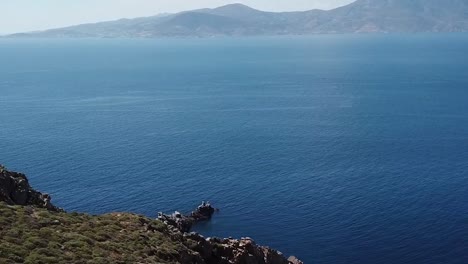 Mykonos-On-Cliff-Face-Aerial-Drone