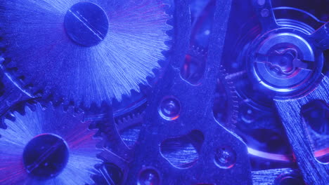 Gears-On-Mechanism-Of-Watch-Under-Red-And-Blue-Light