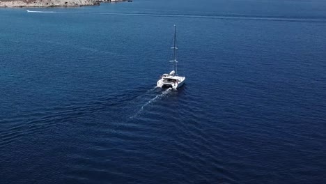 Aerial-Drone-Shot-Yacht-Blue-Water-Mykonos