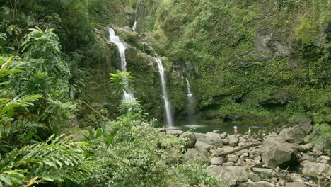 Lush-tropical-forest-and-Waikani-Falls-on-Road-to-Hana-trail,-Maui,-USA