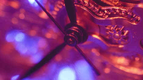 Macro-Of-Second-Hand-Moving-In-Mechanical-Pocket-Watch-With-Blue-And-Red-Light