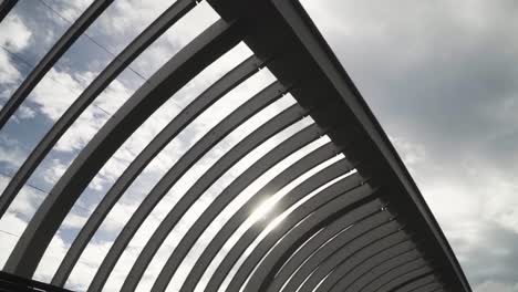 Undulate-Wave-Structure-At-The-Henderson-Waves-In-Singapore-Against-Bright-Cloudy-Sky---wide-shot