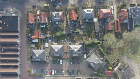Top-down-aerial-of-beautiful-homes-in-suburban-neighborhood