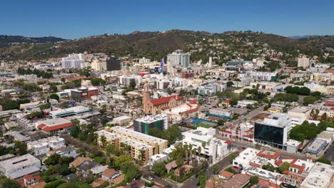 Low-aerial-and-tilting-up-shot-of-downtown-Hollywood