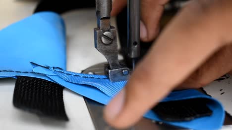 Shaping-cloth-material-using-sewing-machine-closeup
