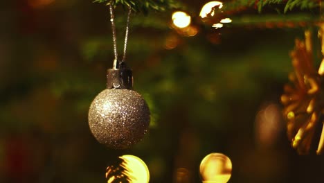 Christmas-decor-ball-hanging-out-from-a-tree-festive-season