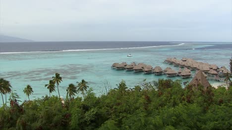 View-from-Toatea-Lookout,-of-the-reef-and-the-over-water-bungalows,-Moorea,-French-Polynesia