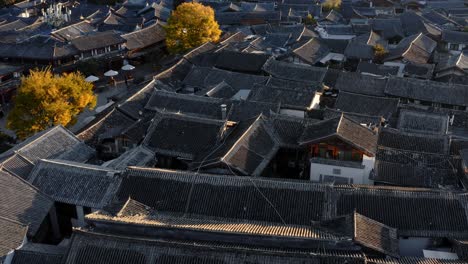 Old-Town-of-Lijiang-city,-China,-traditional-oriental-roof-architecture,-aerial