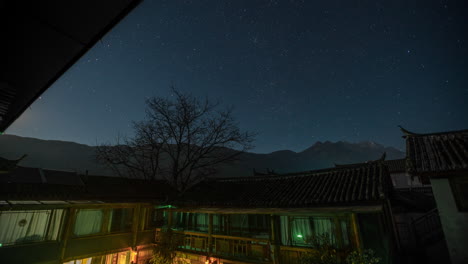 Beautiful-stars-time-lapse-over-traditional-rural-Chinese-village-buildings