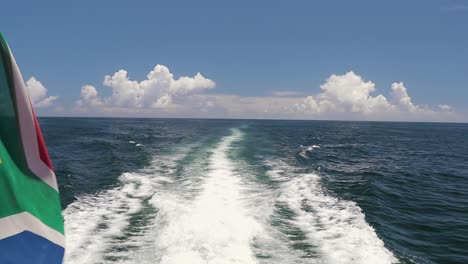 A-shot-of-a-long-water-wake-created-by-the-catamaran's-engines
