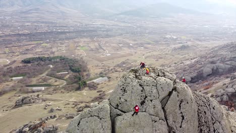 Rock-climbers-climbing-on-a-big-massive-rock