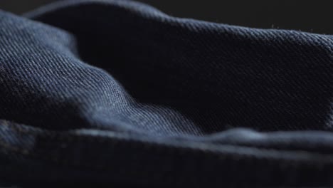 Closeup-Of-Indigo-Blue-Denim-Fabric-During-Manufacturing-Process,-Designer-Fashion