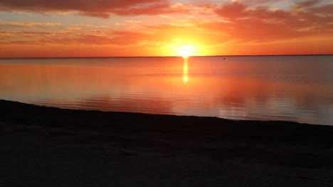 Dazzling-sunset-over-a-calm-Laguna-Madres-estuary-at-North-Padre-Island-National-Seashore-along-Gulf-Coast-of-Texas