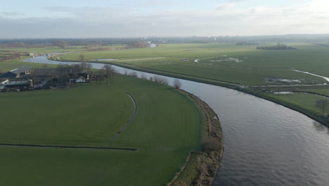 Aerial-of-beautiful-Dutch-landscape-in-the-Rural-Netherlands-with-a-river