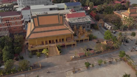 Top-view-of-Golden-Temple-of-Phnom-Penh-in-Cambodia---Aerial-Orbit-point-of-interest-shot