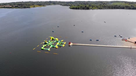 inflatable-water-park-on-Bewl-Water-reservoir-lake-sunny-day-aerial