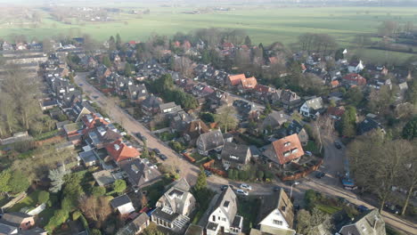 Aerial-of-beautiful-suburbs-in-the-Netherlands---drone-flying-backwards