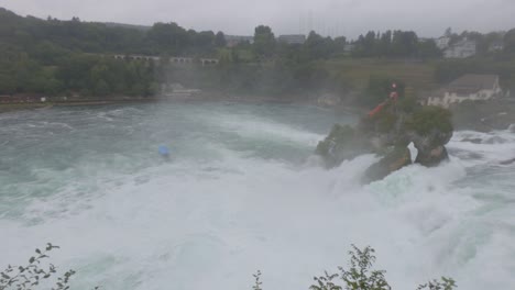 Rhine-Falls-waterfall-rough-waters,-panoramic-view,-Switzerland
