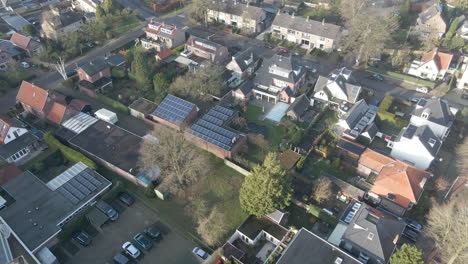 Aerial-of-solar-panels-on-rooftops-of-beautiful-suburban-neighborhood