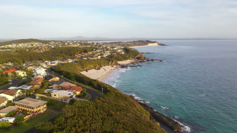 Forster-town-coast-in-New-South-Wales,-Australia,-sunset-aerial-view