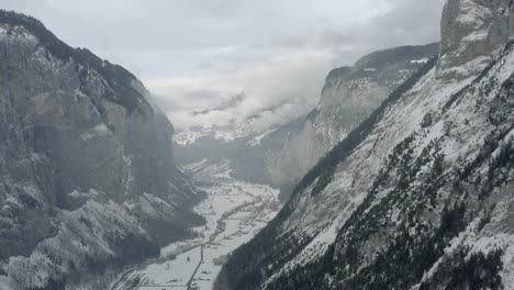 Drone-Aerial-of-Lauterbrunnen-surrounded-by-the-Mountain-Eiger-in-the-swiss-alps