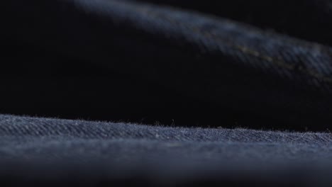 Makroaufnahme-Von-Denim-Jeans-Bekleidungstextilien,-Indigoblauem-Stoffmaterial