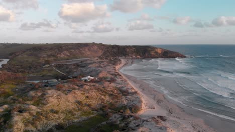 Snelling-Beach-on-Kangaroo-Island-at-sunset,-calm-blue-ocean,-aerial-view