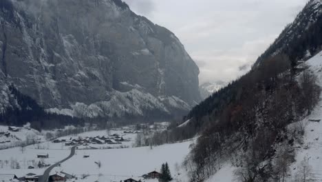 Drone-Aerial-of-Lauterbrunnen-surrounded-by-the-Mountain-Eiger-in-the-swiss-alps